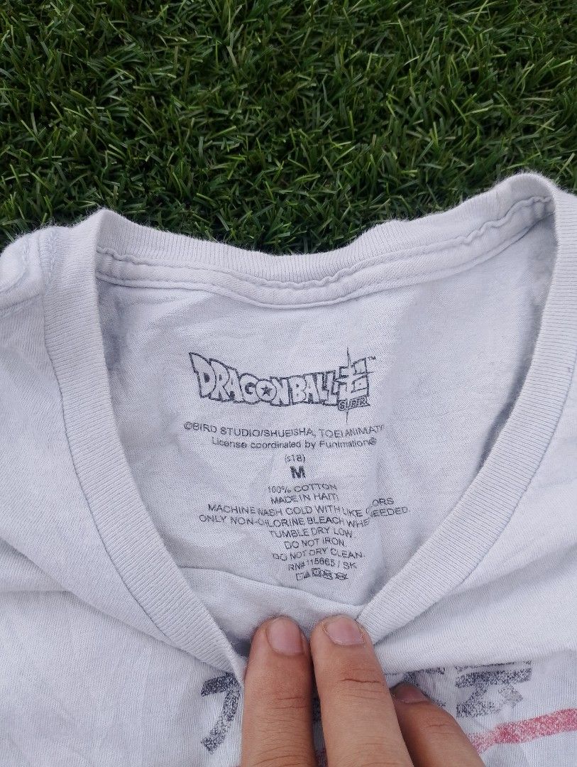 👕 THRIFT FINDS (Category: Activewear) located in Las Pinas. Submitted by shirtsoshorts_24 (Listing ID 1435288977, Image 2). Description: [THRIFT FINDS] Dragon Ball Super “Tournament of Power” ✅ Size: Medium ✅ Original licensed (Toei Animation / Funimation) ✅ Design: Goku vs Jiren ✅ 100% cotton, comfy suotin 📌 Condition: Used (may konting fade sa print pero solid pa suotin) 💰 Price: ₱350 (negotiable) 📩 Pm if interested 📍 Meet up / Shipping av