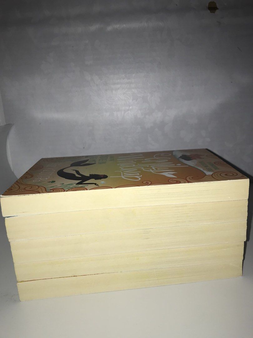 Emily Windsnap Book Series (Category: Storybooks) located in Pilar. Submitted by dhelsomera20308 (Listing ID 1435219755, Image 3). Description: Set of Emily Windsnap books. Includes titles such as "The Falls of Forgotten Island", "The Land of the Midnight Sun", "The Ship of Lost Souls", and "The Pirate Prince". The books are part of the International Bestselling Series. The books are by Liz Kessler..