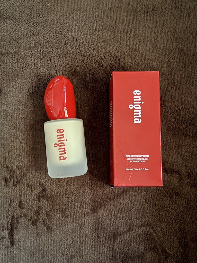 Enigma Skinintroduction Longwear Liquid Foundation (Category: Makeup) located in Batangas. Submitted by misspeachyy (Listing ID 1435216227, Image 1). Description: Enigma Foundation FW02 - IVORY Nagpump lang one time para icheck yung shade, unfortunately, warm siya on my skin. .