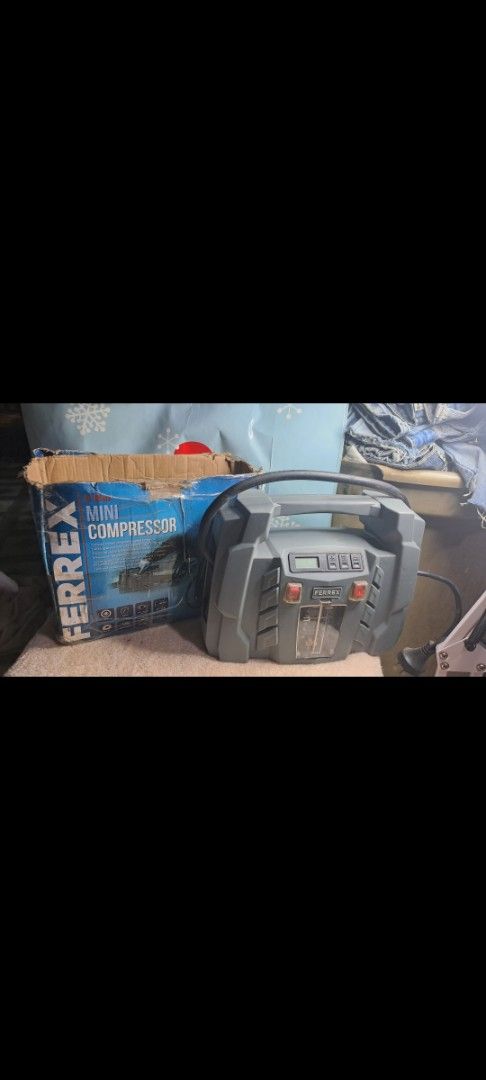 Ferrex Mini Compressor (Category: Construction Tools & Equipment) located in Davao. Submitted by bravemoon_556cd5 (Listing ID 1435335319, Image 2). Description: - Ferrex mini compressor - Includes multiple nozzle attachments - Features AC and DC power switch - Digital display - Comes with the original box - Convenient carrying handle damage box only good as new free sf .