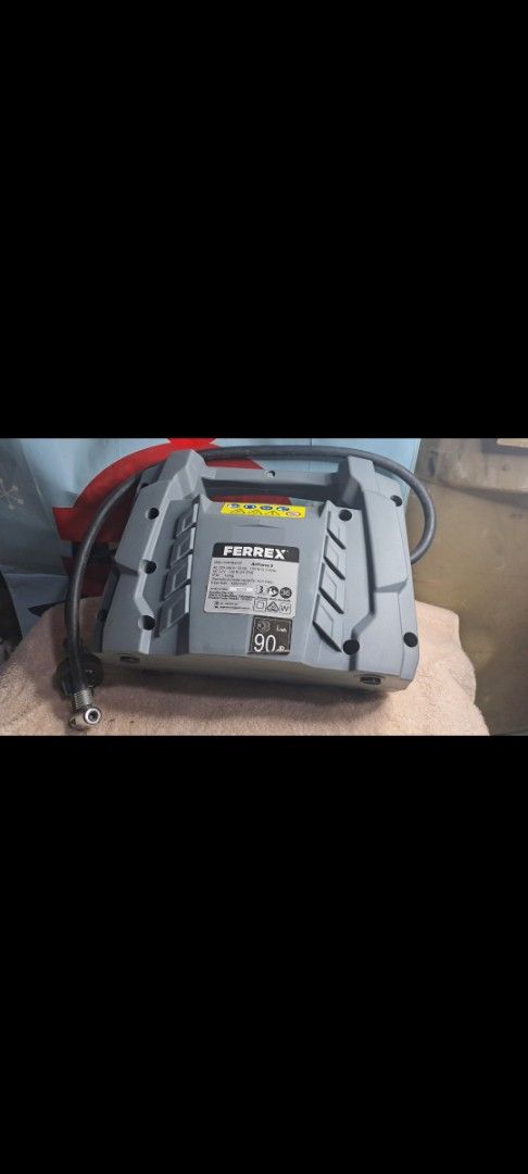 Ferrex Mini Compressor (Category: Construction Tools & Equipment) located in Davao. Submitted by bravemoon_556cd5 (Listing ID 1435335319, Image 3). Description: - Ferrex mini compressor - Includes multiple nozzle attachments - Features AC and DC power switch - Digital display - Comes with the original box - Convenient carrying handle damage box only good as new free sf .