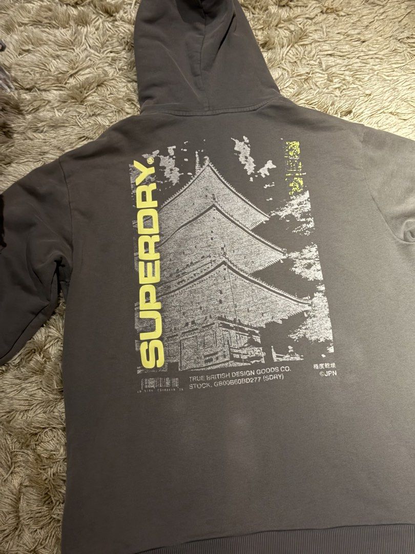Graphic Superdry Hoodie (Category: Coats, Jackets and Outerwear) located in Manila. Submitted by kyle.daniel (Listing ID 1435317010, Image 1). Description: Graphic Superdry Hoodie - Large - Barely used - No issues.