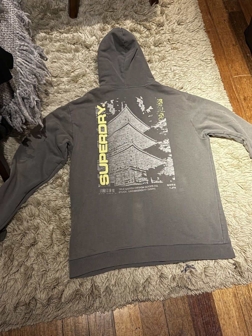 Graphic Superdry Hoodie (Category: Coats, Jackets and Outerwear) located in Manila. Submitted by kyle.daniel (Listing ID 1435317010, Image 3). Description: Graphic Superdry Hoodie - Large - Barely used - No issues.