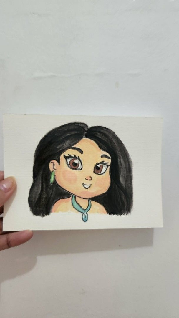 Hand-painted Portrait Artwork (Category: Art & Prints) located in Cavite. Submitted by joycreates (Listing ID 1435248908, Image 3). Description: - Hand-painted artwork - Features a cartoon portrait of a girl - Girl has black hair and brown eyes - Includes turquoise necklace and earrings - UnFramed - Unique art piece - Great for gifts or collecting.