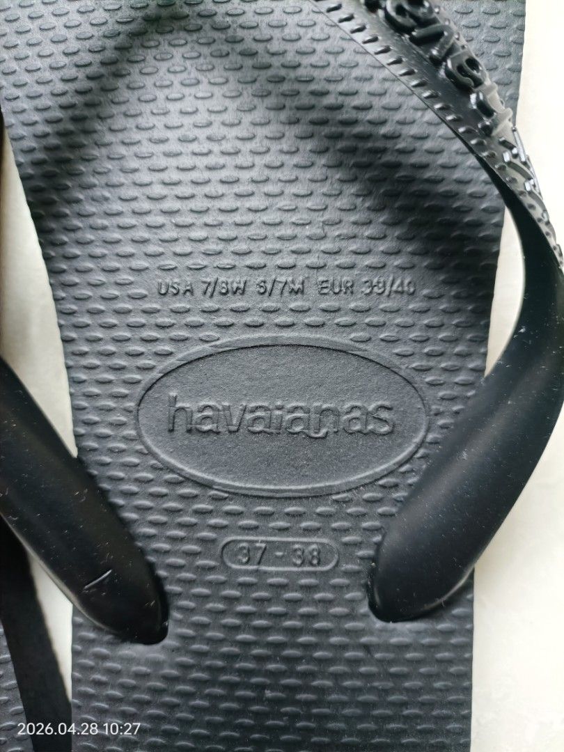 Havaianas Black Flip-Flops - Size 39/40 (US 7/8 W, US 7 M) (Category: Flipflops and Slides) located in Singapore. Submitted by pureearth_f1213a (Listing ID 1435172955, Image 2). Description: - Genuine Havaianas flip-flops - Color: Black - Size: EUR 39/40 - Condition: Good - Perfect for casual wear or the beach - Comfortable and durable - each piece $20, take both please discuss.
