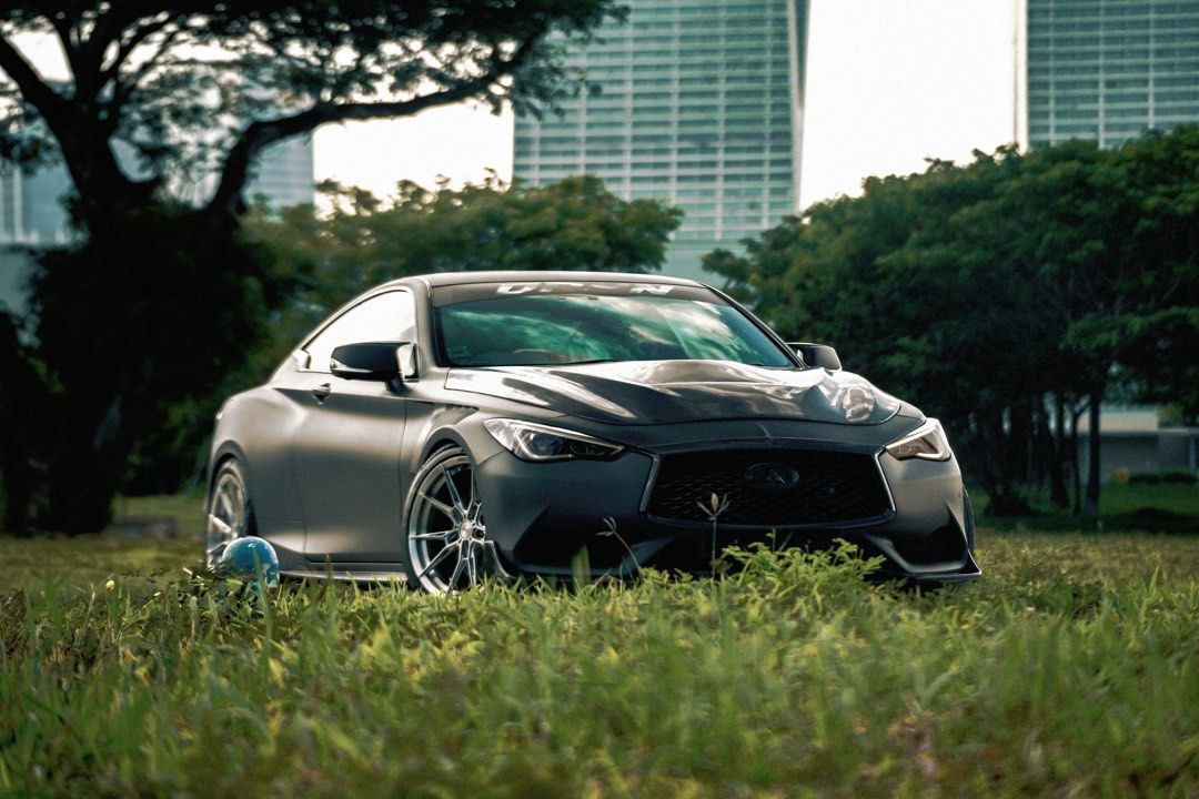 Infiniti Q60 2.0T (A) (Category: Used Cars) located in Singapore. Submitted by laureay (Listing ID 1435329808, Image 2). Description: Nicely modded Infiniti Q60 2.0T with the M274 Mercedes engine (C300, GLC300). Wear and tear done, alongside preventative maintenance for this engine (ATF Cooler Bypass to prevent milkshake issue for M274). Comes stock 211HP, currently running a custom tune for more than 6 months at around 275HP already, pumping 97/