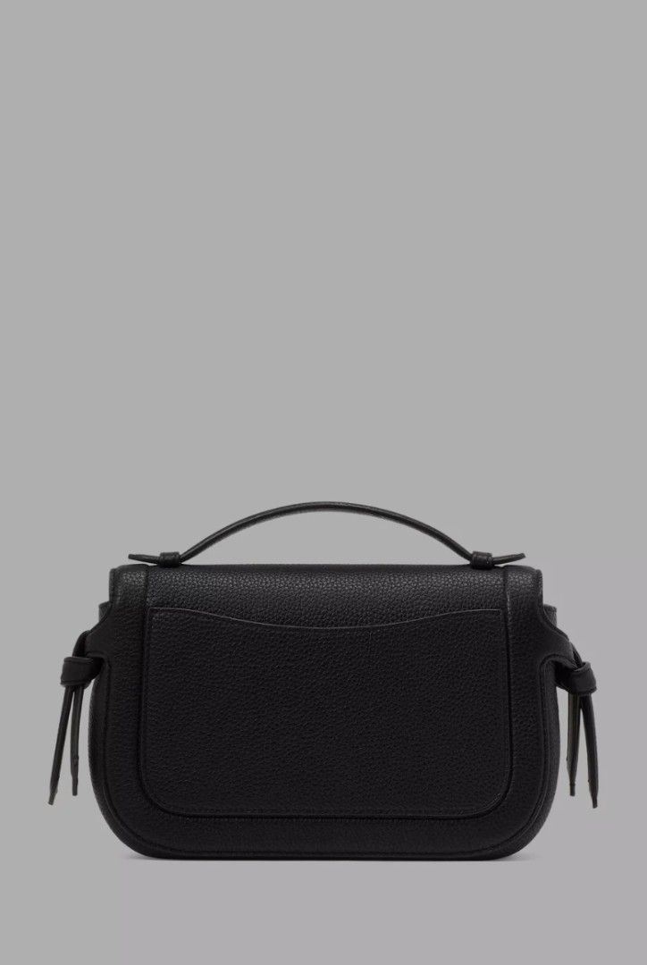 Kate spade Knott Top-handle Crossbody (Category: Cross-body Bags) located in Paranaque City. Submitted by jerrylr (Listing ID 1435297236, Image 3). Description: (With free Small bag insert) Measurements • Length: 3.5" • Height: 6.0" • Width: 9.75" Materials • Pebbled leather • Faille lining Handle • 1.26 - inch handle drop length Strap • Strap drop: 22" Features • Exterior slip pocket • Interior zip pocket, Interior slip pocket • Magnetic snap fl