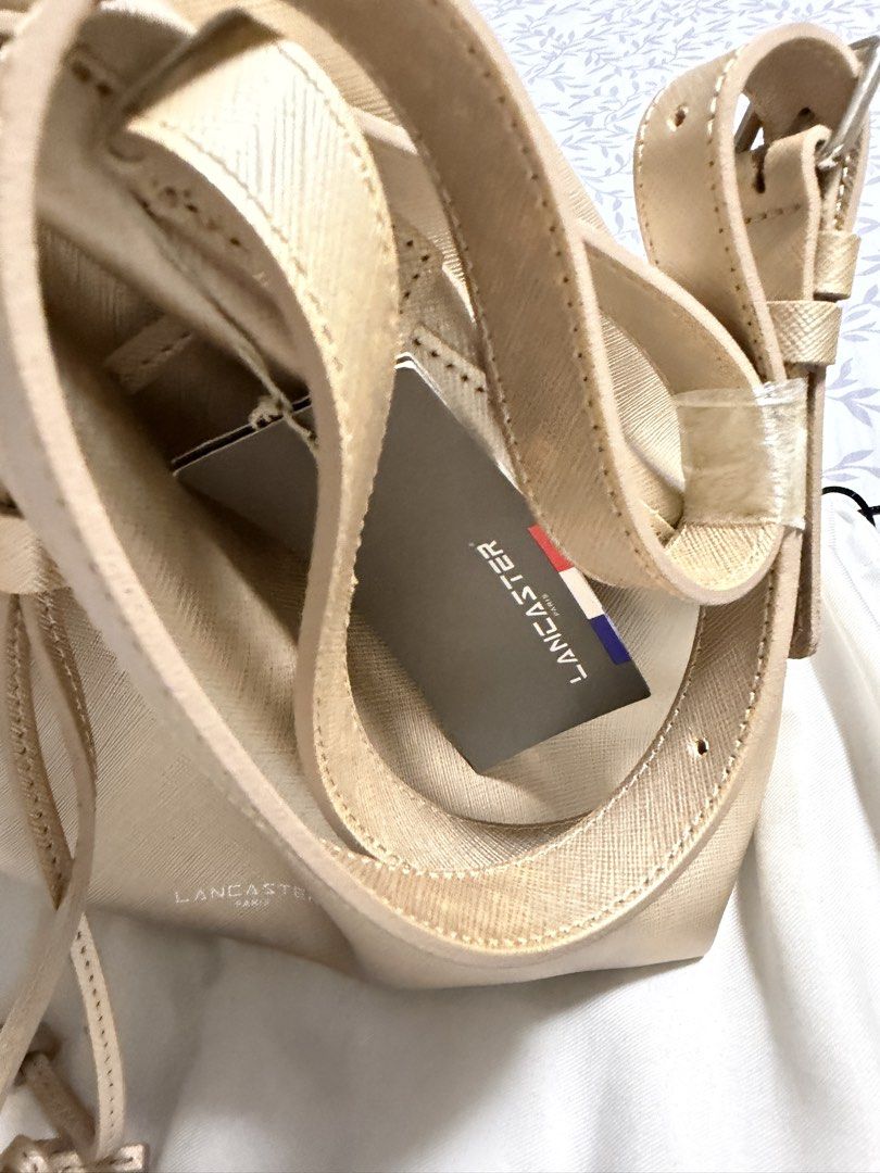 Lancaster Paris - Bucket Bag- Champagne Gold (Category: Luxury Bags & Wallets) located in Manila. Submitted by tw.declutters (Listing ID 1435196321, Image 2). Description: .