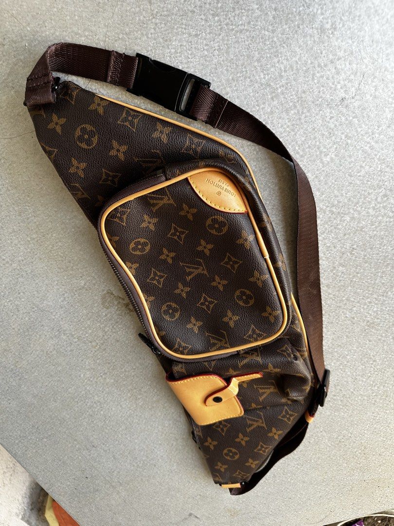 Louis Vuitton Monogram Waist Bag (Category: Luxury Bags & Wallets) located in Manila. Submitted by revineapprl (Listing ID 1435304252, Image 3). Description: Authentic Louis Vuitton waist bag in the classic Monogram pattern. Features multiple compartments, including a front pocket with a flap closure and a zippered main compartment. Adjustable strap for a comfortable fit. The bag showcases the iconic LV monogram throughout. Includes a small leath