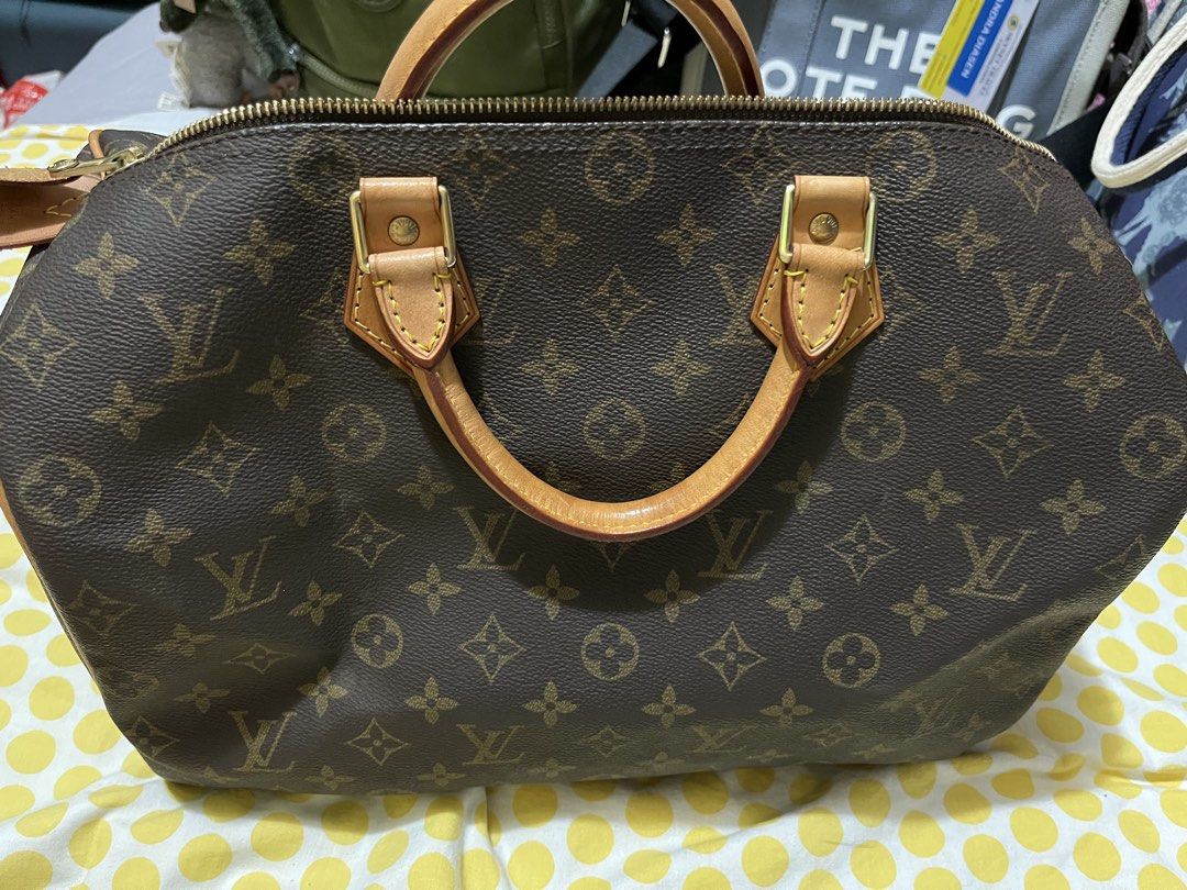 Louis Vuitton Speedy 35 Monogram Handbag (Category: Luxury Bags & Wallets) located in Manila. Submitted by prettygab03 (Listing ID 1435312468, Image 1). Description: - Louis Vuitton Speedy 35 handbag - Iconic Monogram canvas - Rolled leather handles - Top zipper closure - Spacious interior - Gold-toned hardware - Includes Louis Vuitton Paris leather tag -9/10 looks neat - clean inside and out - you will love it. .