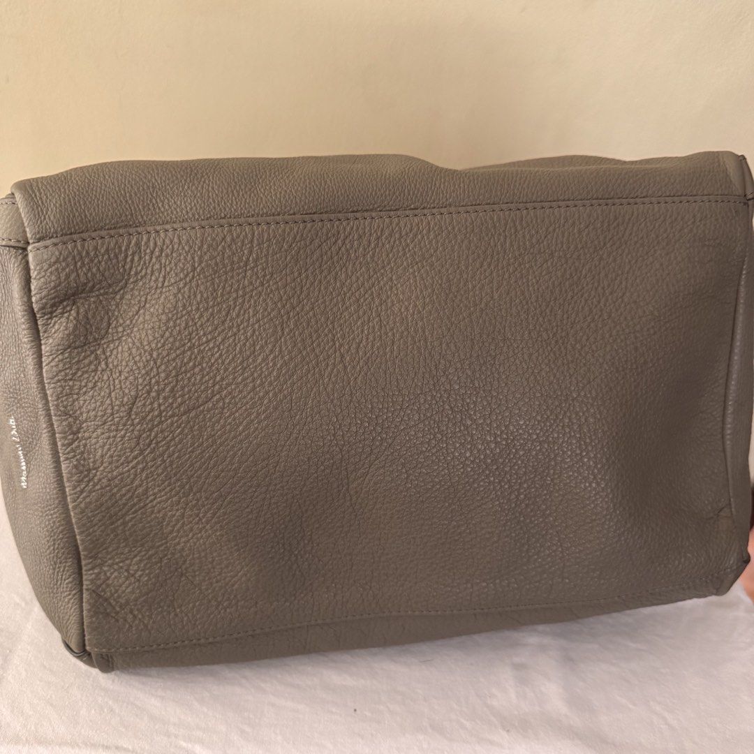 Massimo Dutti dual-strap soft leather bag (Category: Luxury Bags & Wallets) located in Makati City. Submitted by cecilia228 (Listing ID 1435209486, Image 3). Description: Soft, durable pebble-grain high quality calfskin leather Dual-strap, can be used as a handbag or on the shoulder Neutral, taupe color Spacious interior Measurements: W 32cm D 10cm H 22cm .