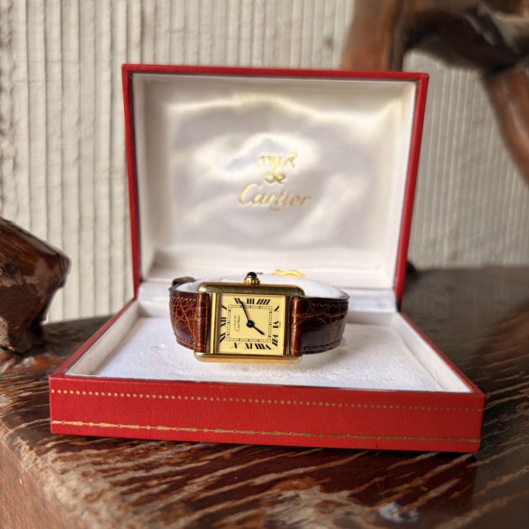 Must de Cartier Tank Watch (Category: Luxury Watches) located in Calamba. Submitted by chanalcaras (Listing ID 1435335727, Image 1). Description: - Cartier Tank Vermeil watch - Unisex - Engraved case back: "Cartier Paris Vermeil Tank Quartz Plaque Or G 20M Argent 925 Swiss Made" - 1990s Vintage Watch a luxurious and iconic timepiece - Original leather strap - Comes with original red Cartier box .