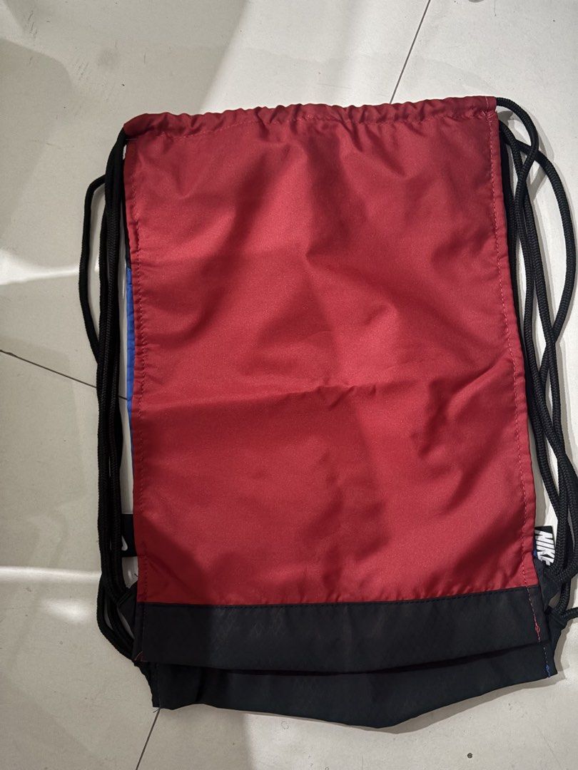 Nike sling back pack. Available in red and blue. (Category: Backpacks) located in Quezon City. Submitted by fairyg (Listing ID 1435249214, Image 3). Description: .