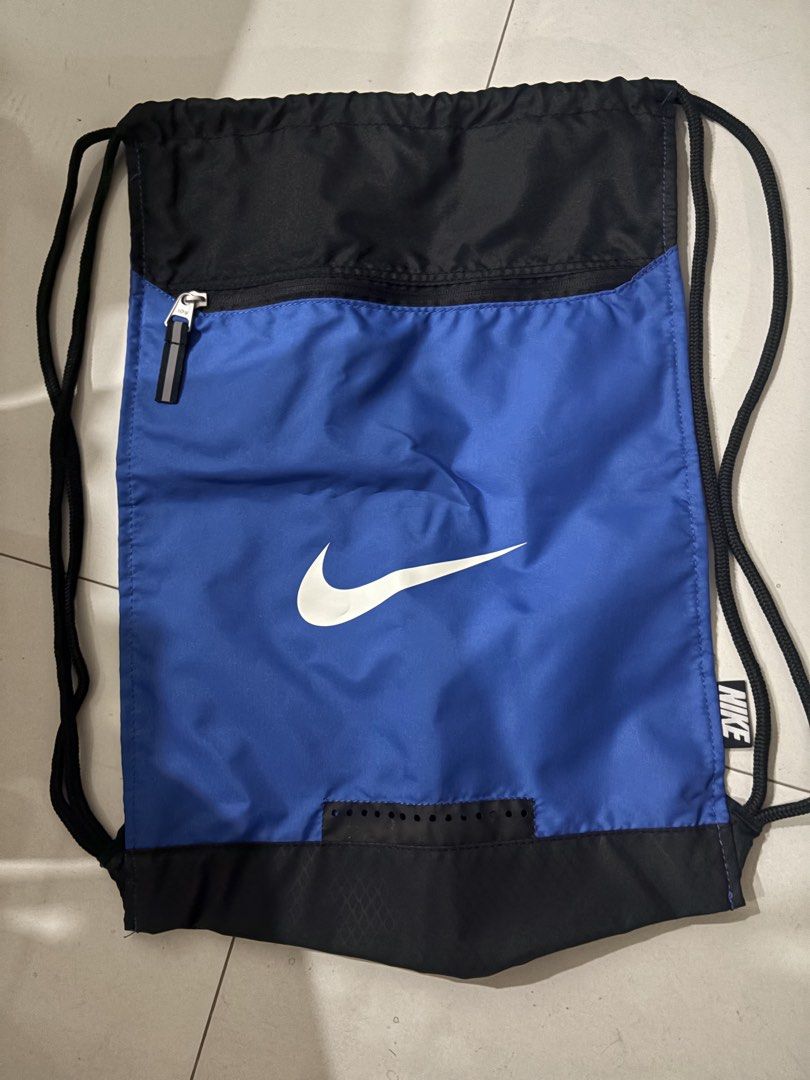 Nike sling back pack. Available in red and blue. (Category: Backpacks) located in Quezon City. Submitted by fairyg (Listing ID 1435249214, Image 2). Description: .