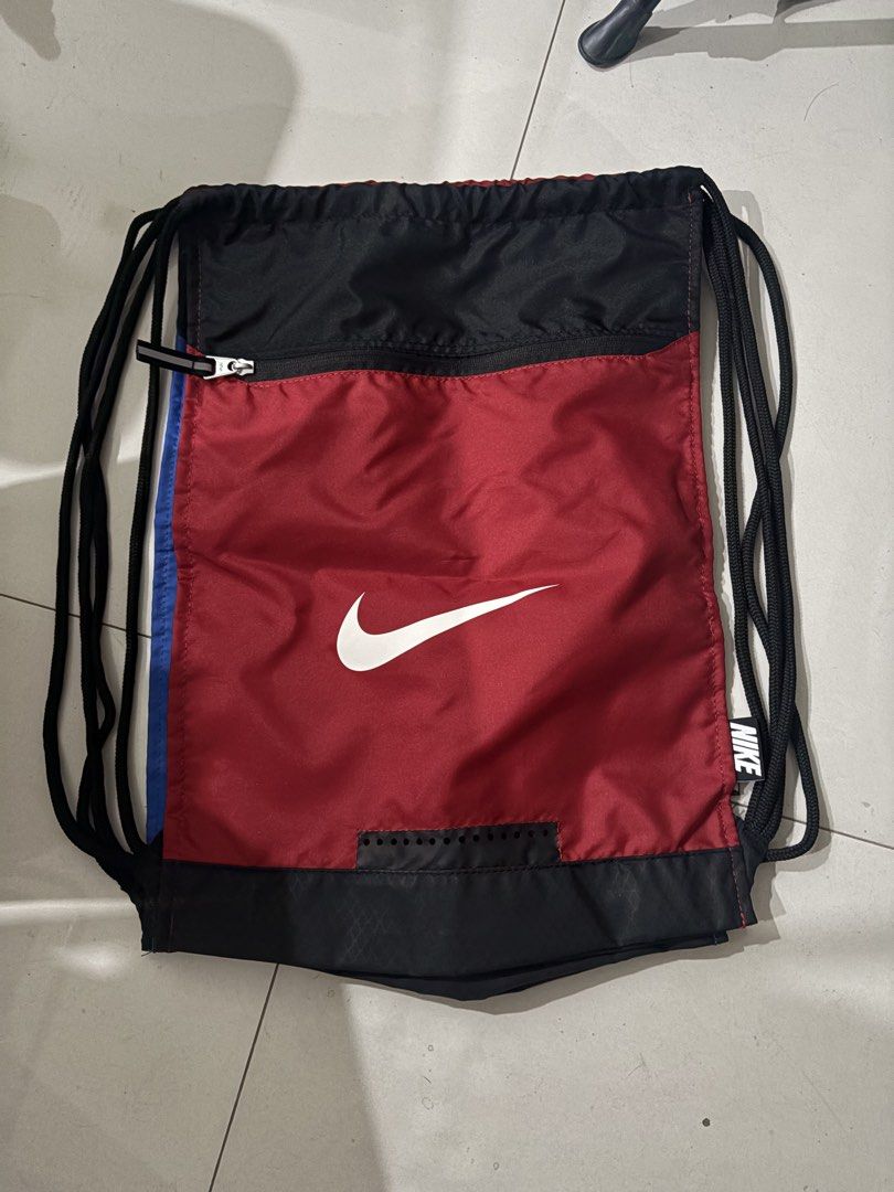Nike sling back pack. Available in red and blue. (Category: Backpacks) located in Quezon City. Submitted by fairyg (Listing ID 1435249214, Image 1). Description: .