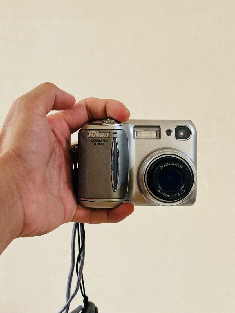 Nikon Coolpix 4300 Digital Camera (Category: Cameras) located in Quezon City. Submitted by jaysriveroooo (Listing ID 1435207551, Image 3). Description: Nikon Coolpix 4300 Digital Camera - Good working condition - Fully functional - Ready to use - Clear LCD - Clean lens - Clean viewfinder - Good cosmetic condition, refer to pics. - With carrying case, battery, charger, 2 GB CF card (worth 400), lens cap wrist strap. - 4.1 megapixels - CCD - 3x opt