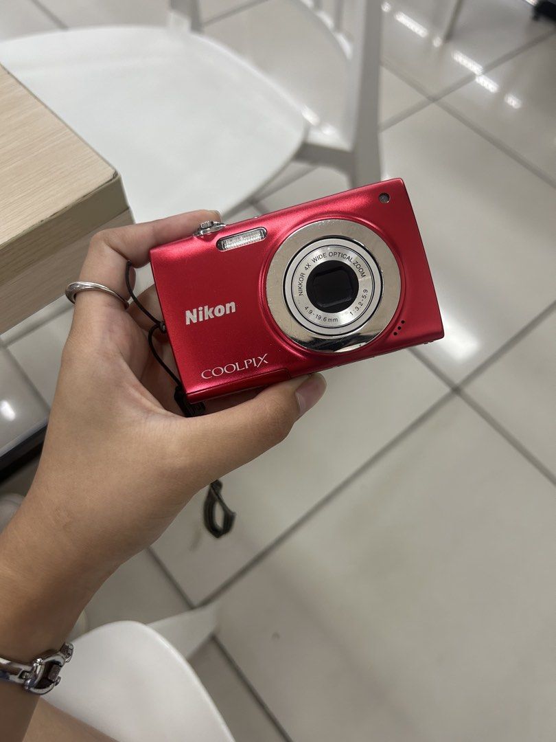 NIKON Coolpix S2500 Digicam Digital Camera (Category: Cameras) located in Lagonoy. Submitted by nadayojiii (Listing ID 1435188641, Image 1). Description: NIKON Coolpix S2500 in red🍒 5999 complete inclusions ALL FUNCTIONS WORKING -flash working -zoom working -all buttons working -has 1 small lens dust(visible when zoomed only) CRISP SHOTS🌅 READY TO USE Inclusions: -unit -battery -charger -SD card -stickers -strap open for meet up and shipping.