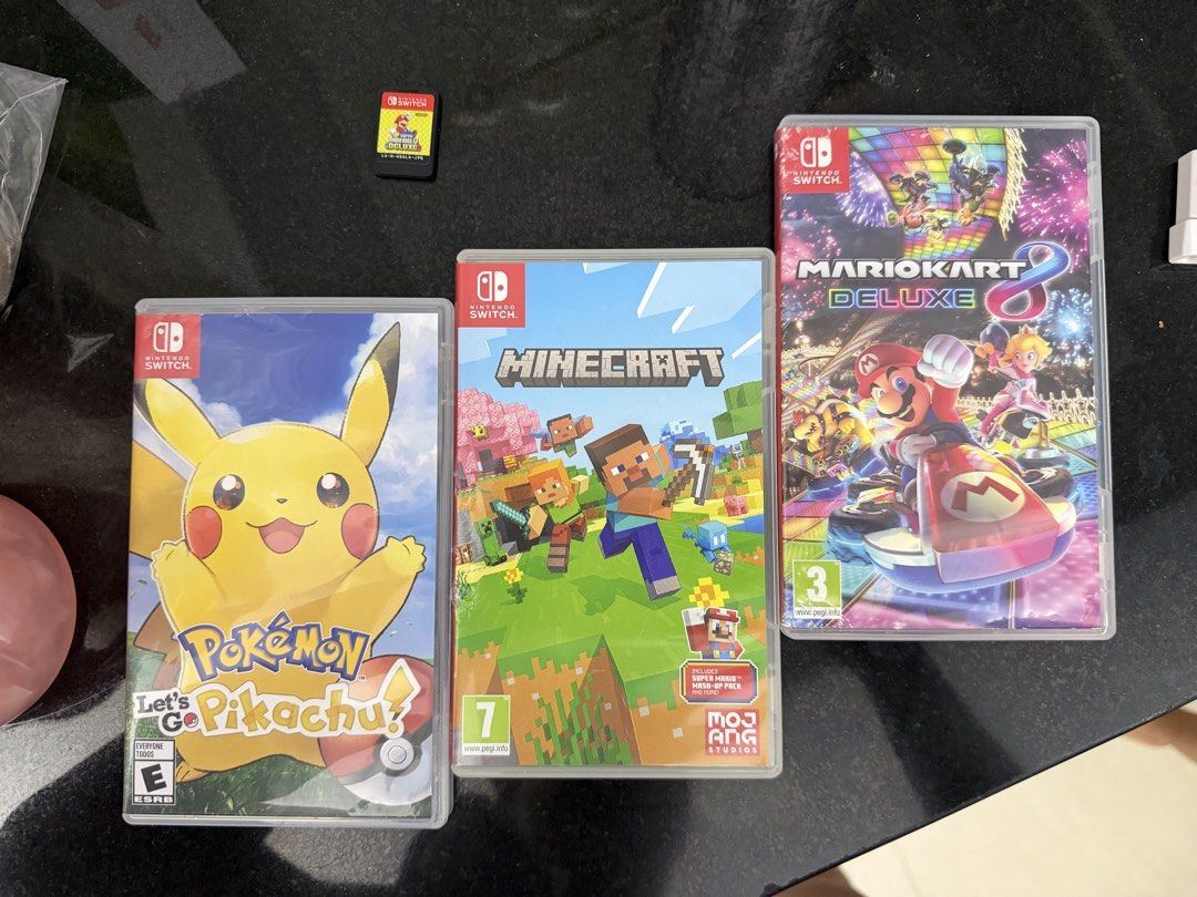 Nintendo Switch Games (Category: Nintendo) located in Quezon City. Submitted by marvmarvvv (Listing ID 1435046282, Image 1). Description: For Sale Mario Kart Deluxe - 1,600 Mario Bros Deluxe - 1,200 (Card Only) Minecraft - 1,500 Pokemon Let’s Go Pikachu - 1,700 Loc: Taytay.