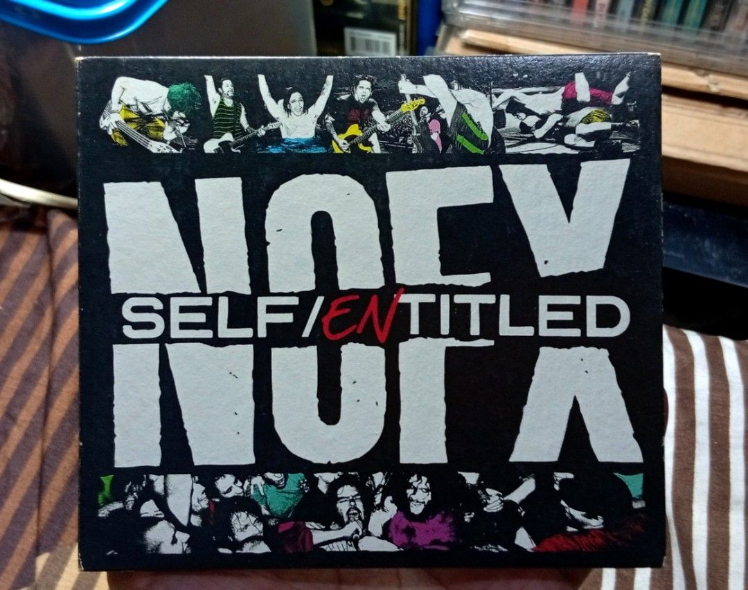 NOFX Self/Entitled CD (Category: CDs & DVDs) located in Manila. Submitted by back_to_the_thrift (Listing ID 1435289246, Image 1). Description: - NOFX "Self/Entitled" CD album - Includes the CD, album art, and tracklist - Features popular tracks: "72 Hookers", "I Believe in Goddess", and "Cell Out" - Comes in its original case.