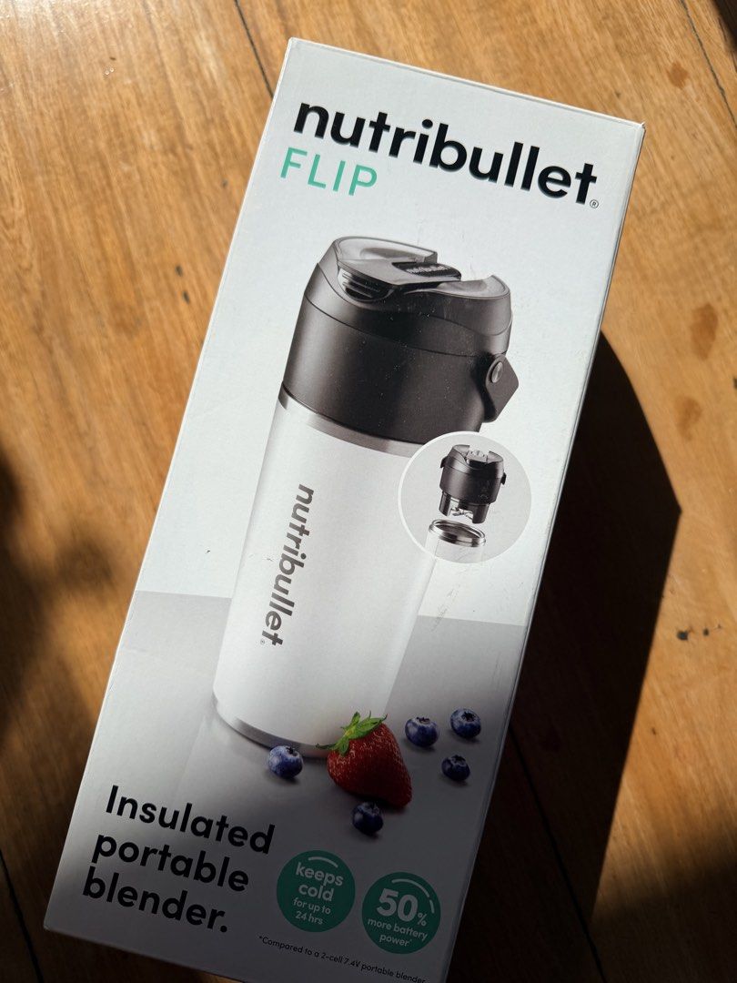 Nutribullet Flip Insulated Portable Blender (Category: Juicers, Blenders & Grinders) located in Quezon City. Submitted by camillelaude (Listing ID 1435177618, Image 1). Description: - Nutribullet Flip: Portable insulated blender. - Self-cleaning for easy maintenance. - Keeps drinks cold for up to 24 hours. - 8-piece set includes charger, cable, to-go lid, and cleaning brush. - 50% more battery power. - Designed for blending and sipping directly f