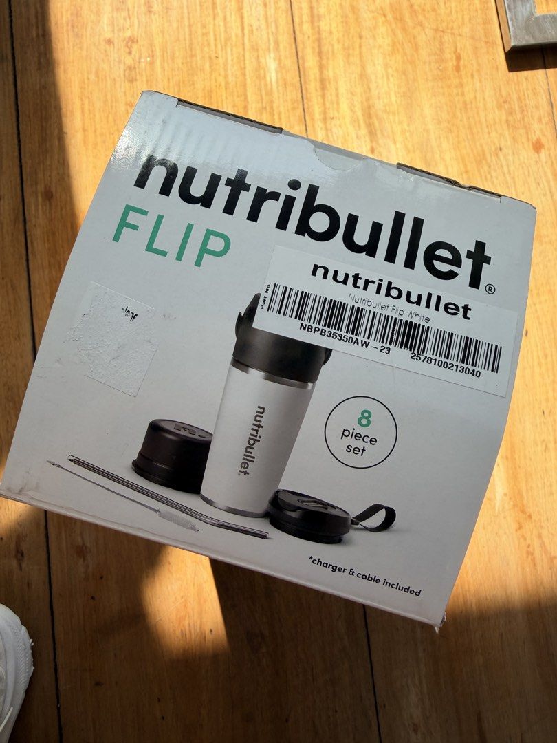 Nutribullet Flip Insulated Portable Blender (Category: Juicers, Blenders & Grinders) located in Quezon City. Submitted by camillelaude (Listing ID 1435177618, Image 2). Description: - Nutribullet Flip: Portable insulated blender. - Self-cleaning for easy maintenance. - Keeps drinks cold for up to 24 hours. - 8-piece set includes charger, cable, to-go lid, and cleaning brush. - 50% more battery power. - Designed for blending and sipping directly f