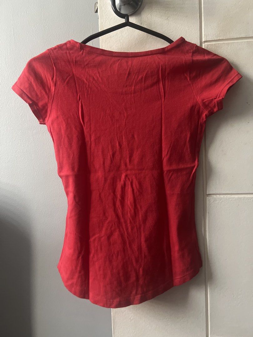 Old Navy Happy Everything Red T-shirt (Category: Babies & Kids Fashion) located in Marikina City. Submitted by prelovedreeses (Listing ID 1435177212, Image 2). Description: RFS: Decluttering Red Old Navy t-shirt with "HAPPY EVERYTHING" printed on the front. It has a scoop neck and short sleeves. The size is S/P (6-7). Made in Dominican Republic. The back of the shirt is plain red..