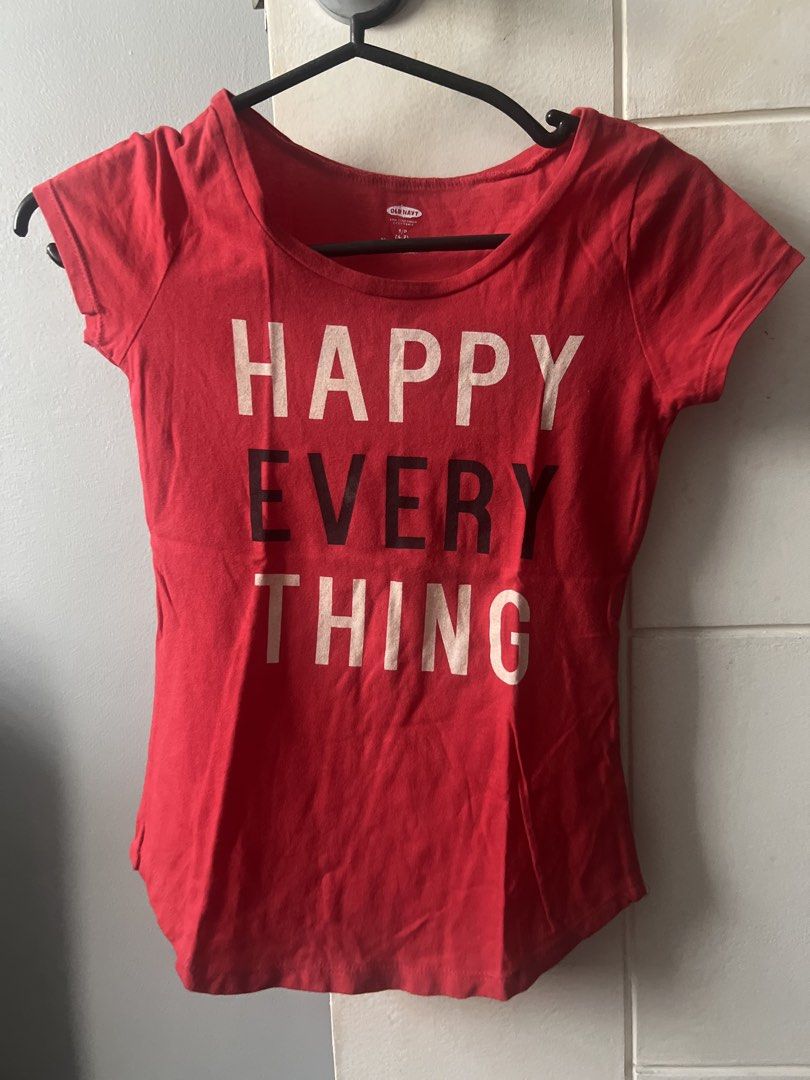 Old Navy Happy Everything Red T-shirt (Category: Babies & Kids Fashion) located in Marikina City. Submitted by prelovedreeses (Listing ID 1435177212, Image 1). Description: RFS: Decluttering Red Old Navy t-shirt with "HAPPY EVERYTHING" printed on the front. It has a scoop neck and short sleeves. The size is S/P (6-7). Made in Dominican Republic. The back of the shirt is plain red..