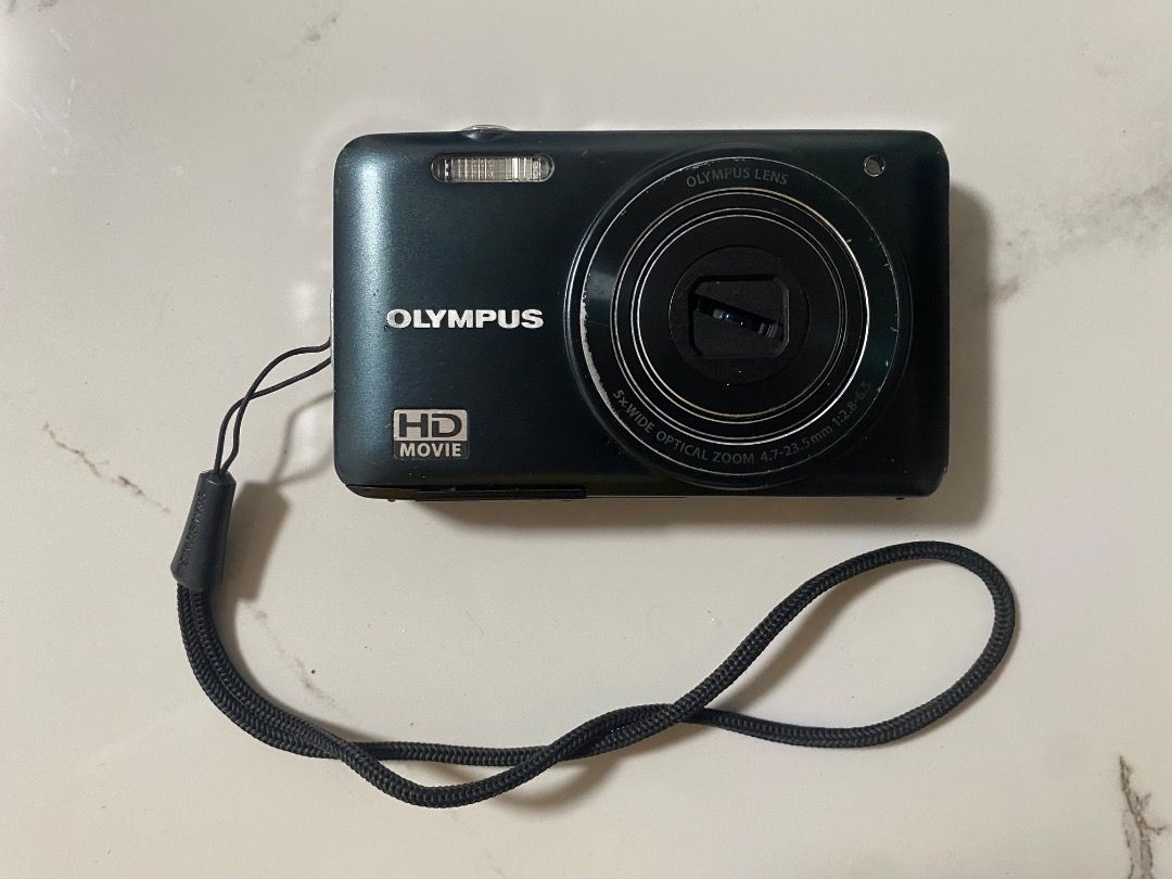 OLYMPUS VG130 DIGICAM (Category: Cameras) located in Batangas. Submitted by beatrizpad09003 (Listing ID 1435271608, Image 1). Description: x sensi. sample pics are unedited. can turn on but can’t take a pic because of lens error. pm for more sample pics. has free universal charger & memory card..