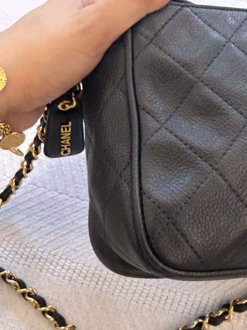 Original Vintage Chanel Camera Bag (Category: Luxury Bags & Wallets) located in San Juan City. Submitted by exclusivelyours (Listing ID 1435325277, Image 3). Description: This is a highly sought-after piece from the mid-90s, specifically crafted in Black Caviar Leather with 24k Gold-Plated Hardware. (Verified by LegitGrails with certificate included) While Chanel still makes camera bags, this specific boxy, structured vintage shape with the large