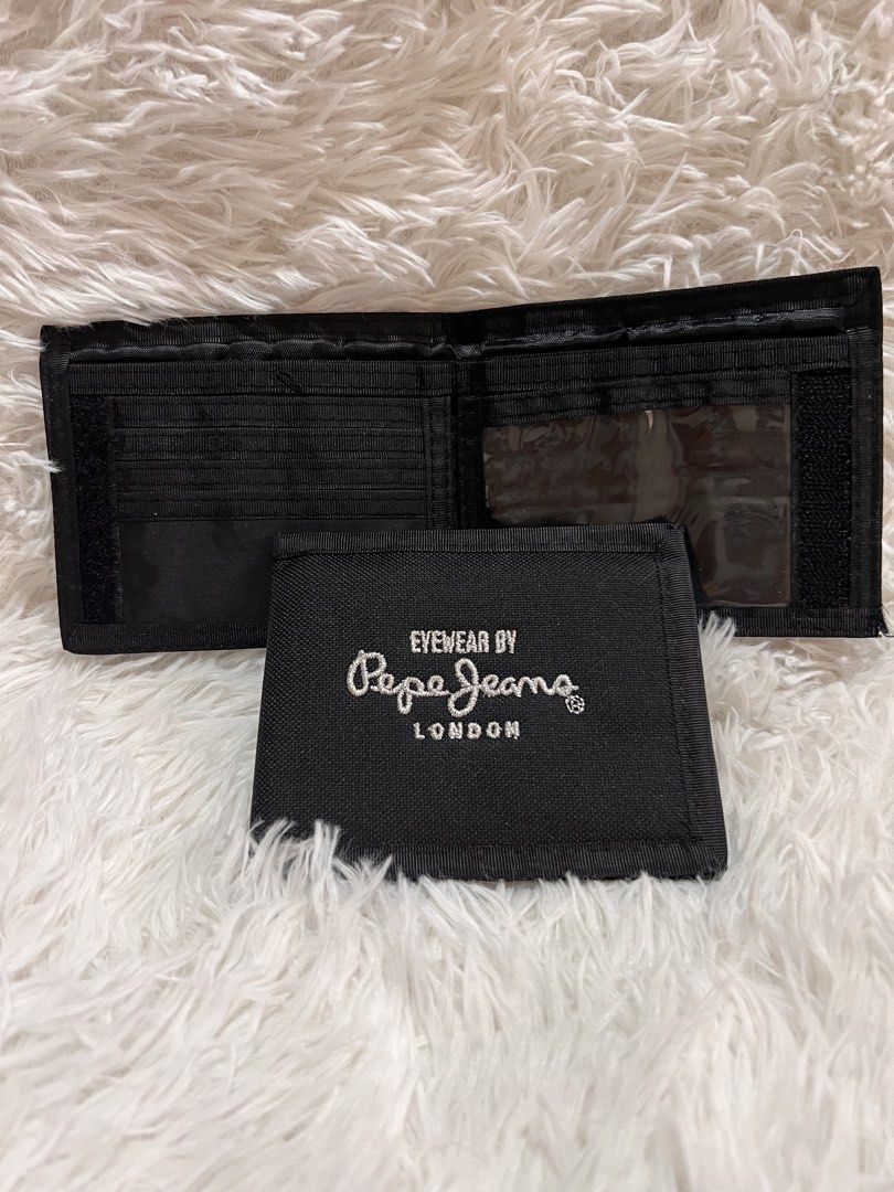 PEPE JEANS BIFOLD CANVASS WALLET (Category: Wallets & Card Holders) located in Muntinlupa City. Submitted by hermanasbfl (Listing ID 1435217294, Image 1). Description: Pepe Jeans Wallet 250 each canvas Lightweight For young boys RFS : Decluttering 📦SF : c/o buyer 🚚J&T/Lbc 🏧Gcash/Bdo.