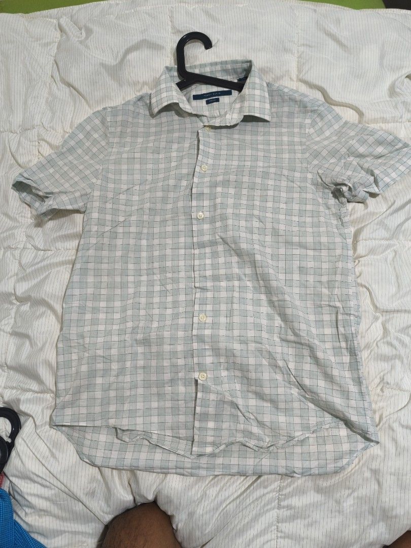 Perry Ellis Short Sleeve Checkered Shirt (Category: Tshirts & Polo Shirts ) located in Davao. Submitted by igor_rogi (Listing ID 1435205418, Image 1). Description: - Perry Ellis short-sleeved shirt - Checkered pattern - Button-down front - Collared neckline - Lightweight stretch fabric - Perfect for warm weather - Versatile style.