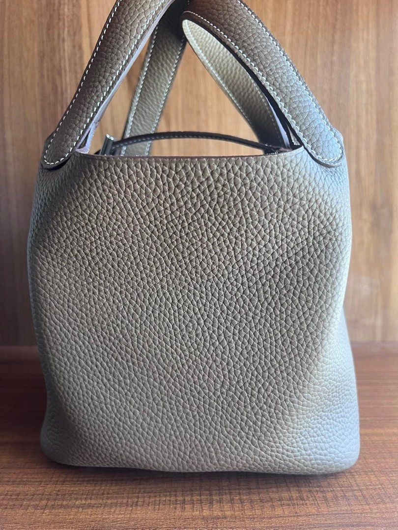PICOTIN 18 (Category: Luxury Bags & Wallets) located in Malabon City. Submitted by truepenguin_22c2e4 (Listing ID 1435235738, Image 3). Description: Hermes Picotin 18 in Etoupe Condition:Pre-Love Color: Etoupe Leather: Clemence Hardware: Palladium Size: 18 x 18 x 13 cm Includes:dustbag and lock set .