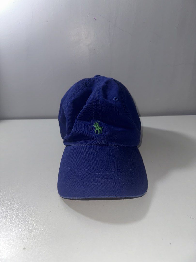 Polo Ralph Lauren Leatherstrap Ball Cap Blue Dadhat (Category: Caps & Hats) located in Santa Barbara. Submitted by marcaws (Listing ID 1432943092, Image 1). Description: - Authentic Polo Ralph Lauren cap - Color: Blue colorway / Green Pony - Color rate: 9.5/10 - Vintage Leather strap back - Size: Adult size -Condition: Like new - No issues.
