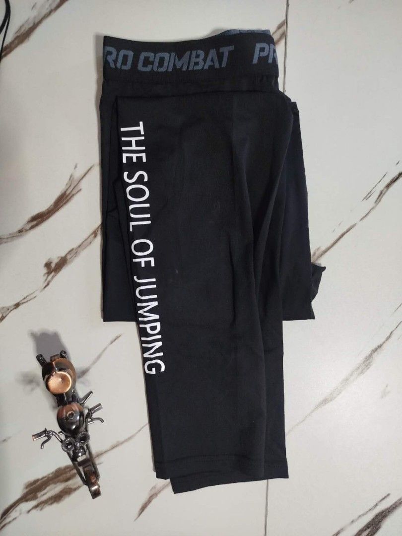Pro Combat Compression Pants (Category: Activewear) located in Mandaluyong City. Submitted by allinthehood (Listing ID 1435247352, Image 3). Description: - Black compression pants - "PRO COMBAT" print on waistband - "THE SOUL OF JUMPING" print on side - Brand: Exercise EPRO - Engineered for champion athletes.
