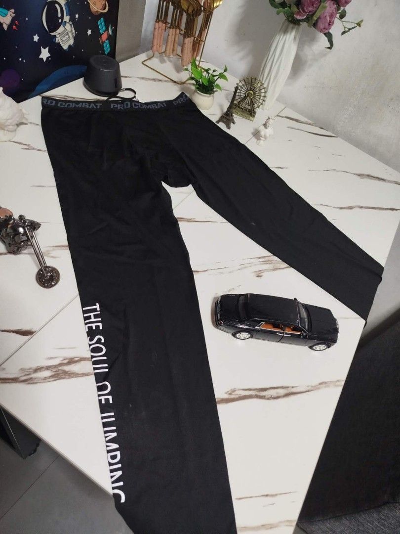 Pro Combat Compression Pants (Category: Activewear) located in Mandaluyong City. Submitted by allinthehood (Listing ID 1435247352, Image 2). Description: - Black compression pants - "PRO COMBAT" print on waistband - "THE SOUL OF JUMPING" print on side - Brand: Exercise EPRO - Engineered for champion athletes.