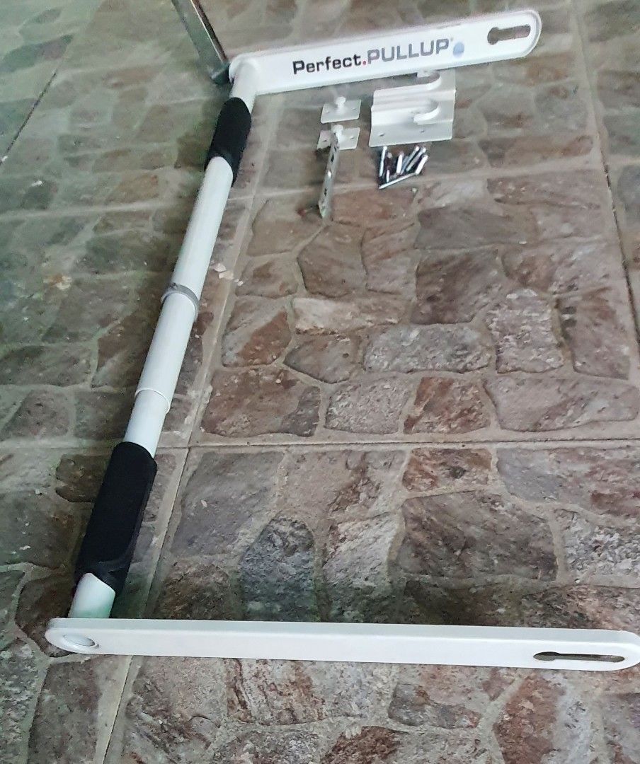 Pull-up Bar with Mounting Hardware (Category: Weights & Dumbbells) located in Caloocan City. Submitted by tonyboyrz (Listing ID 1435272436, Image 3). Description: Perfect Pullups Doorway Bar - From Canada - Slight Used - 60-100cm Adjustable Doorway Pull ups bar. - White pull-up bar - Black padded grips for comfort - Includes all mounting hardware - Designed for doorway or wall mounting - Perfect for indoor Workout - Ready to install - No Issue& i