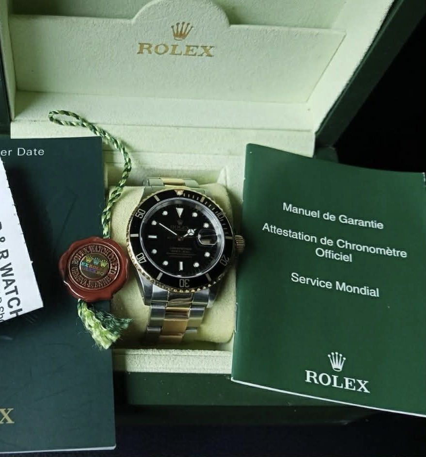 Rolex Submariner Two-Tone (Category: Luxury Watches) located in Antipolo. Submitted by liziebee (Listing ID 1435287325, Image 1). Description: - Rolex Submariner two-tone watch - Black dial and gold bezel - 116613LN - with box and manual - no card - open to authenticate.