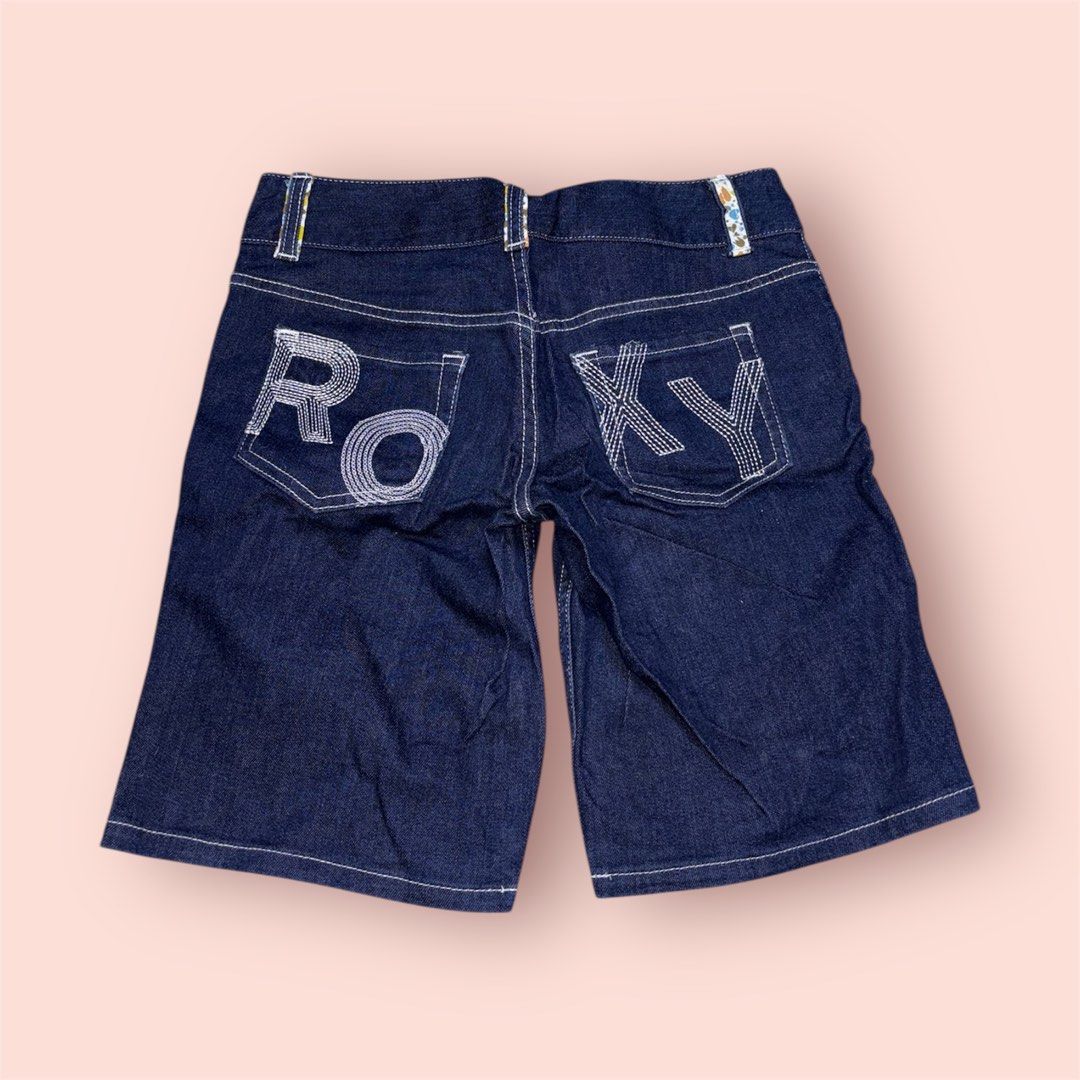 Roxy Denim Shorts (Category: Shorts) located in Rosario. Submitted by preloveditems2002 (Listing ID 1435229989, Image 1). Description: - Roxy denim shorts - Features Roxy logo on back pockets - Classic five-pocket design - Button and zipper closure - Floral patterned interior waistband - Perfect for casual wear.