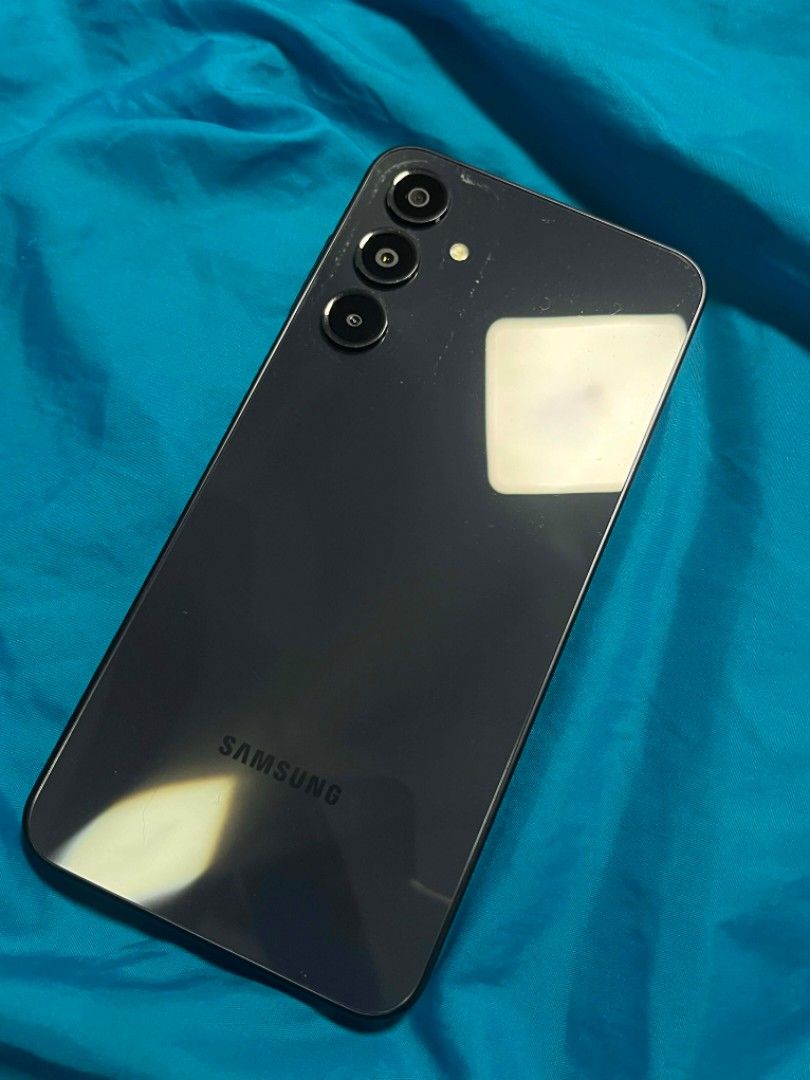 SAMSUNG A16 5G [4 + 128 GB] (Category: Samsung) located in San Pedro. Submitted by giants_ (Listing ID 1435271405, Image 2). Description: SAMSUNG A16 5G - 50 MP Cam (with 0.5) - Android 16 - 4 GB RAM & 128 GB - 6.7 inch display - Bought 9 Months Ago, September 6, 2025 Inclusions: Unit only Honest Flaw (SEE Pic): May marking ng case around the camera, not sure if na reremove sha with hard cleaning but doesn't affect camera performance. Always Nego