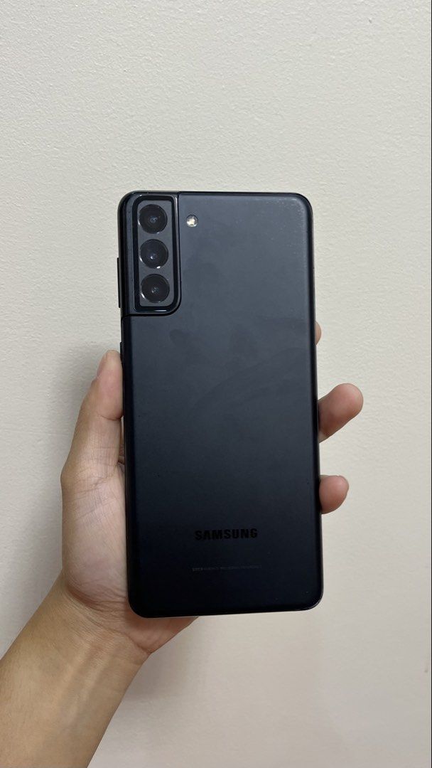 Samsung Galaxy S21 + 5G (Category: Samsung) located in Angeles City. Submitted by 3z.ph (Listing ID 1435311126, Image 2). Description: Price: ₱7,000 (slightly negotiable) Model: Samsung Galaxy S21 + 5G Storage: 256 GB RAM: 8 GB (RAM Plus feature) Color: Black Condition: Good overall performance, no lag, issue only on display (does not affect performance) Issue: screen problem, minor phone scratches Battery: Decent/ still usable for daily use RFS:
