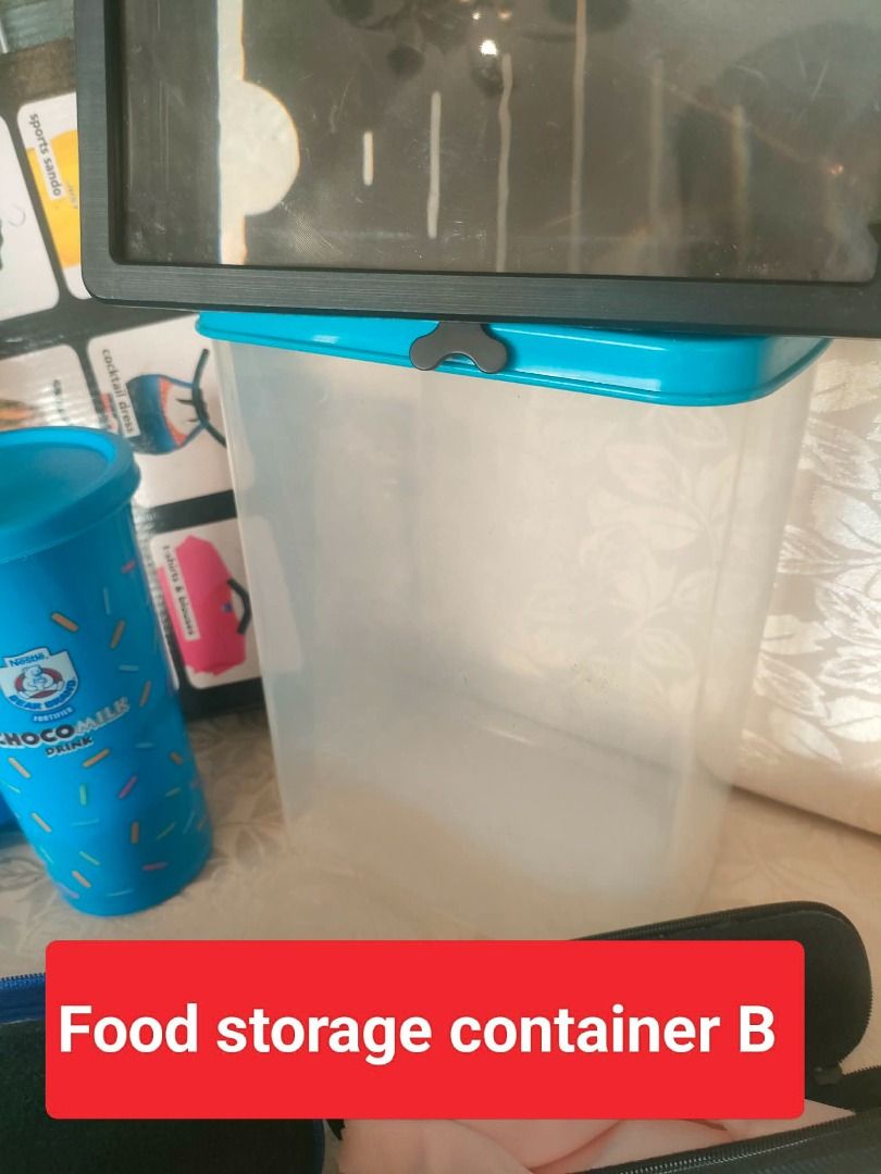 Set B: Food Storage, Tumblers, Hanger, Pitcher (Category: Other Kitchenware & Tableware) located in Caloocan City. Submitted by rise-edge (Listing ID 1435204039, Image 2). Description: - Food storage container - 2 Nestle Choco Milk tumblers - Flexi Hanger - Water pitcher - Pair of blue Spoon and Fork cases - Spider-Man lunchbox (Well Used) - Mobile Screen Enlarger - Eye Glasses Cases Selling all items for PHP500.00!.