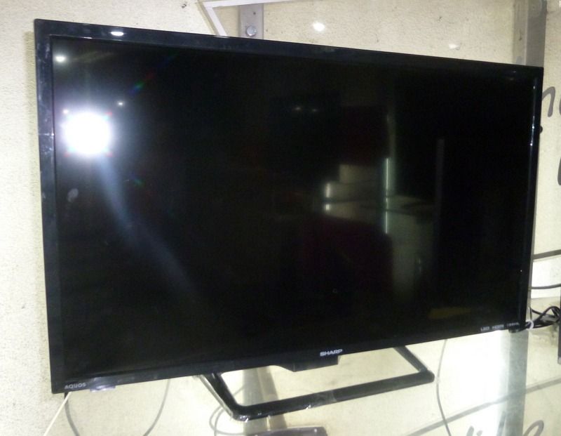 Sharp 32" HD TV (Category: TV) located in Manila. Submitted by edjavier92685 (Listing ID 1435317916, Image 1). Description: - Sharp Aquos 32" HD TV - HD Resolution: WXGA (1366 x 768) - Connectivity: HDMI & USB ports - Features: MHL, AquaMotionLite 200/240Hz - Antenna Booster included - Easy color adjustment - Super Eco Mode for energy saving.