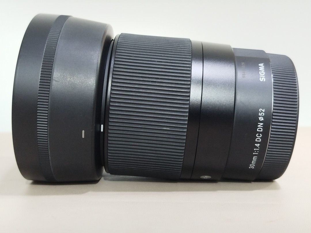 Sigma lens 30mm f1.4 E mount aps-c (Category: Lens & Kits) located in Panglao. Submitted by techcode (Listing ID 1435328613, Image 1). Description: For Sony APS-C Well taken care of lens. No scratch. No scuffs. No dust. No haze inside glass. No dents. The focus ring moves smoothly. Handled professionally. Storage: Dry cabinet 45% - 47% RH.
