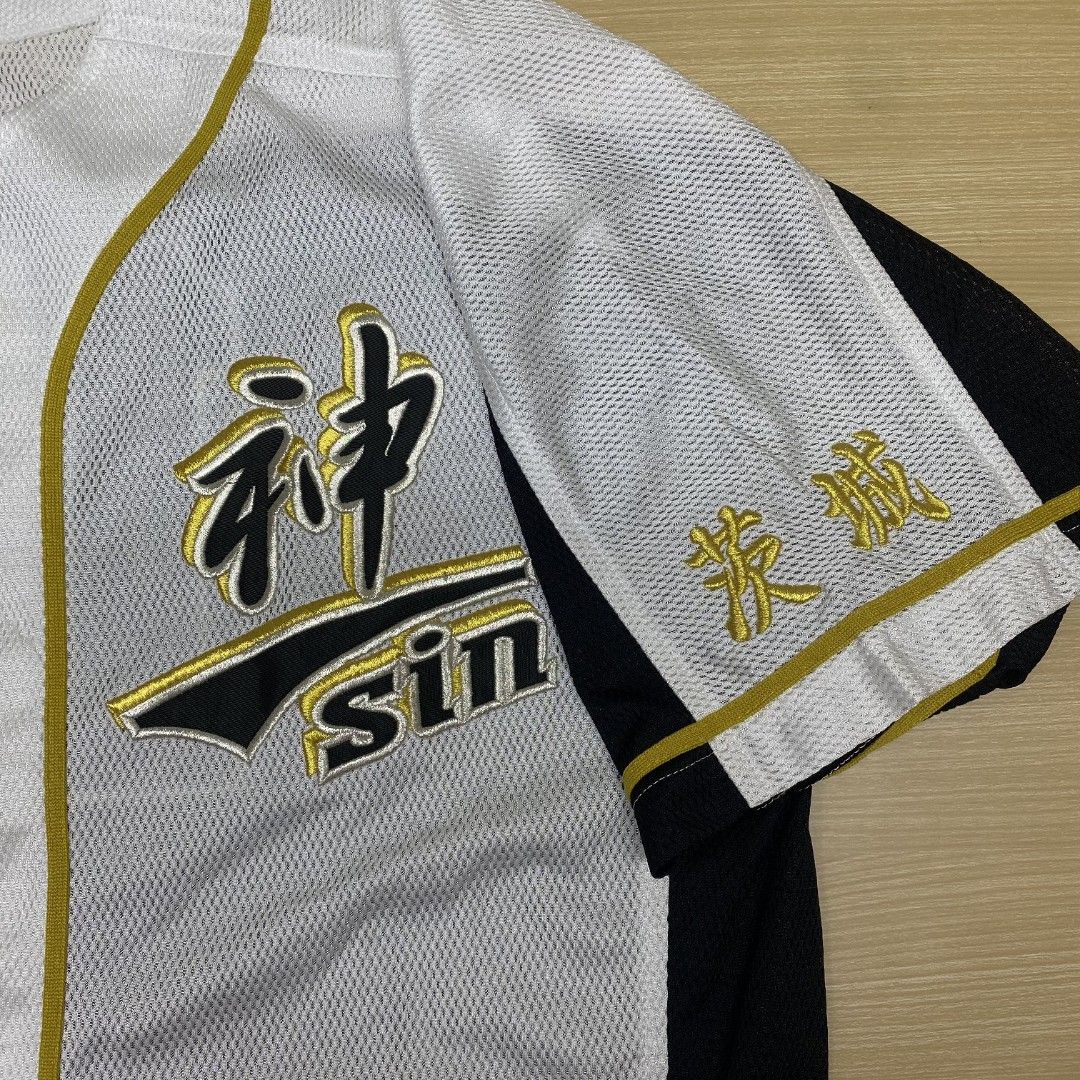 Sin Baseball Jersey - Size Unknown (Category: Tshirts & Polo Shirts ) located in Navotas City. Submitted by jericafits (Listing ID 1435270201, Image 3). Description: • Reward Virtual World Baseball Jersey 📏 Size: L 📏 Dimes: 23 x 29.5 - 34 ₱ 999 + sf - Baseball jersey with a white, black, and gold color scheme. - Features "Sin" in gold lettering and Japanese characters on the front. - Gold number "19" on the back. - Button-up front. - Short slee