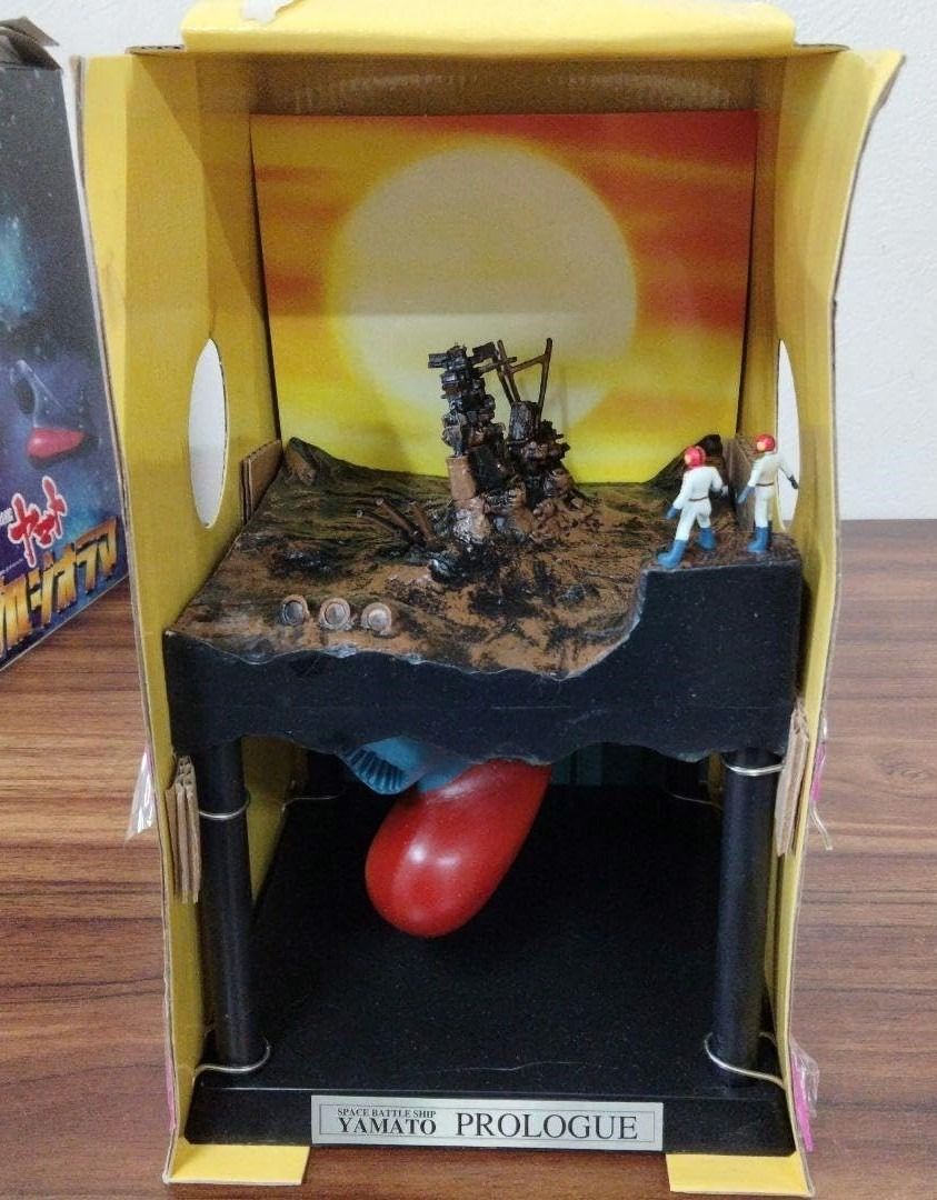 Space Battleship Yamato Diorama Figure (Category: Figurines & Statues) located in Santo Tomas. Submitted by pickers_corner (Listing ID 1435199206, Image 2). Description: - Space Battleship Yamato diorama figure - Features a prologue scene - Comes in original box - Box has Japanese text and graphics - Diorama includes miniature figures and spaceship - Box shows some wear and tear - Likely a collectible item.