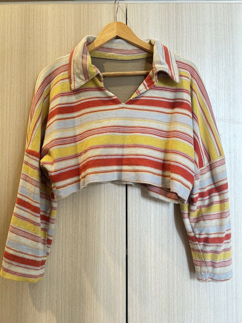 Striped Crop Top and Shorts Set (Category: Sets or Coordinates) located in Cainta. Submitted by kayeshoppe (Listing ID 1435336158, Image 2). Description: - Matching crop top and shorts set - Collared, long-sleeved crop top - Shorts with elastic waistband - Red, yellow, and light blue horizontal stripes - Made of terry cloth material - Perfect for a casual, comfortable look.