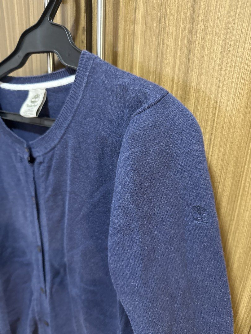 Timberland Navy Blue Cardigan (Category: Coats, Jackets and Outerwear) located in Quezon City. Submitted by dropdeadprices (Listing ID 1435175830, Image 2). Description: - Navy blue Timberland cardigan Never used - Size: XS but fits small/medium - Material: 100% cotton - Features: Button-down front, long sleeves - Design: Timberland logo on upper left sleeve .