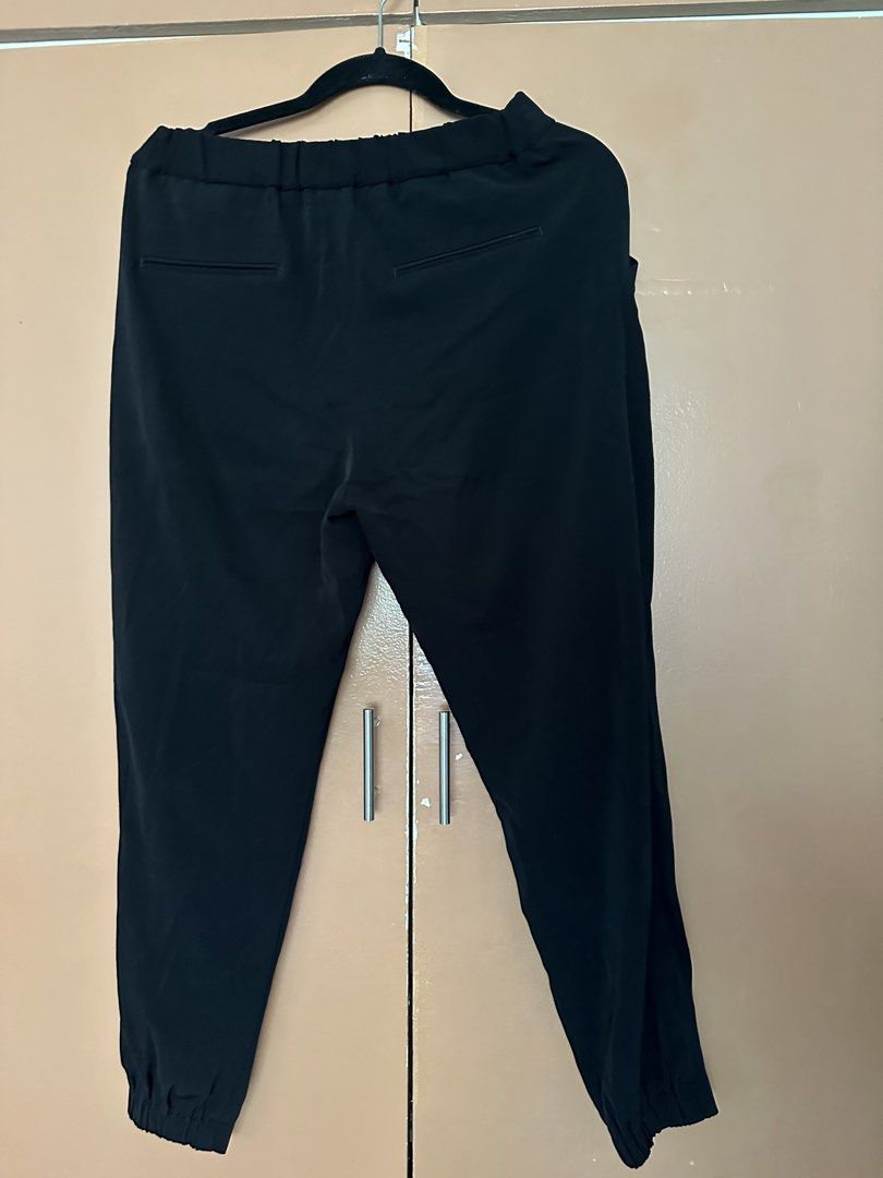 Uniqlo Tapered Pants - Pleated (Category: Other Bottoms) located in Mandaluyong City. Submitted by ja.declutters (Listing ID 1435280637, Image 2). Description: Take both for ₱700.