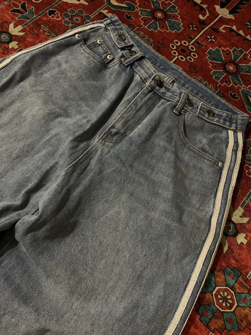 Vault Vintage Wide Leg Jeans (Category: Jeans) located in Cagayan de Oro. Submitted by chabermz (Listing ID 1435189980, Image 3). Description: - Vault Vintage wide-leg jeans - Light blue wash - White stripes on sides - Relaxed fit - Button and zipper closure - Two front and two back pockets - Vault Vintage label visible - Need wash Dimes W- 32 T- 14.5 L- 42 H- 11.