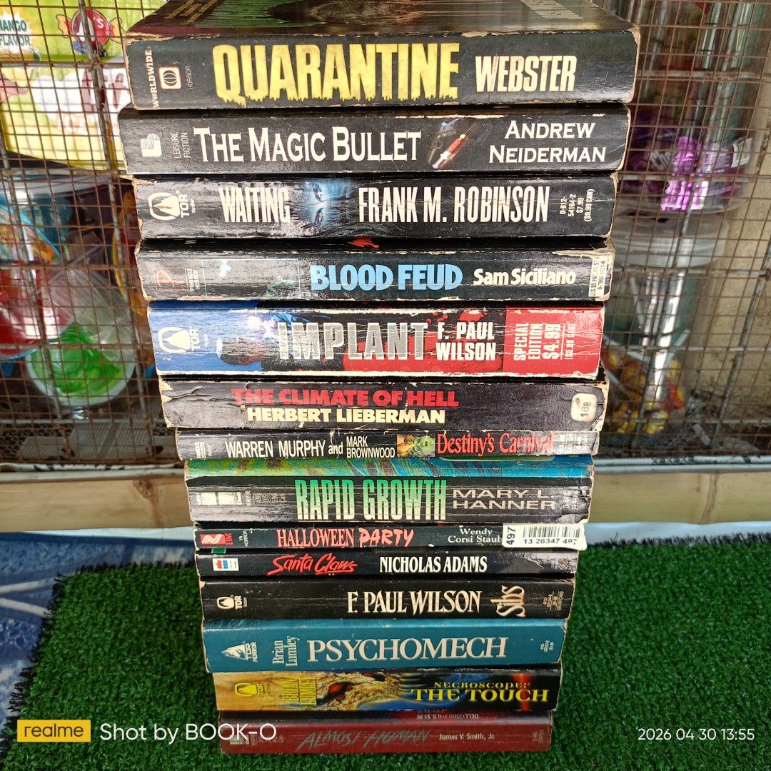 Vintage Assorted Horror/Thriller Paperback Books (Category: Storybooks) located in Polangui. Submitted by jumyrace2 (Listing ID 1435226646, Image 3). Description: Collection of assorted horror and thriller paperback books. Titles include "Quarantine", "The Magic Bullet", "Waiting", "Blood Feud", "The Climate of Hell", "Implant", "Sibs", "Rapid Growth", "Destiny's Carnival", "Halloween Party", "Santa Claws", "Almost Human", "Necroscope: The Touch"